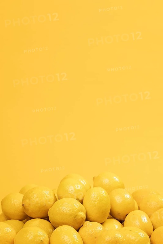 Bunch raw lemons with copy space