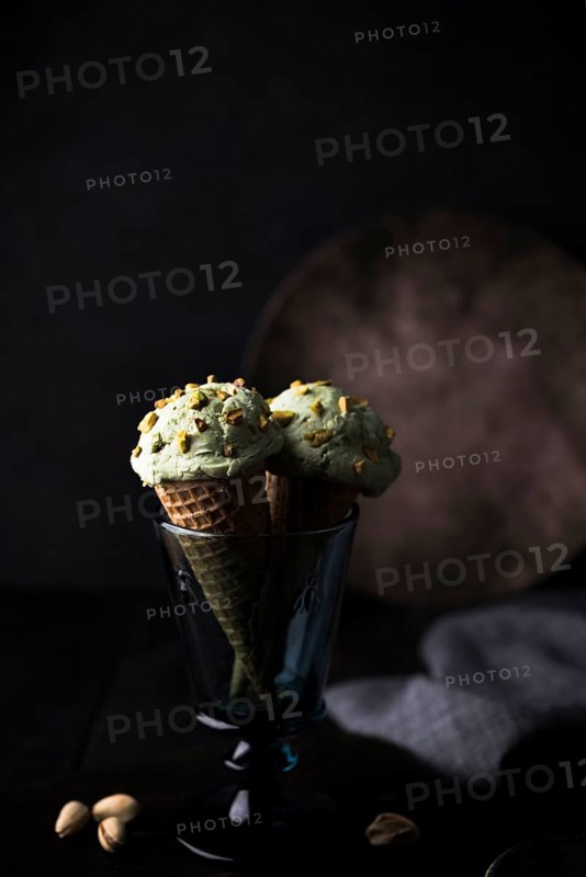 Front view pistachio icecream with nuts