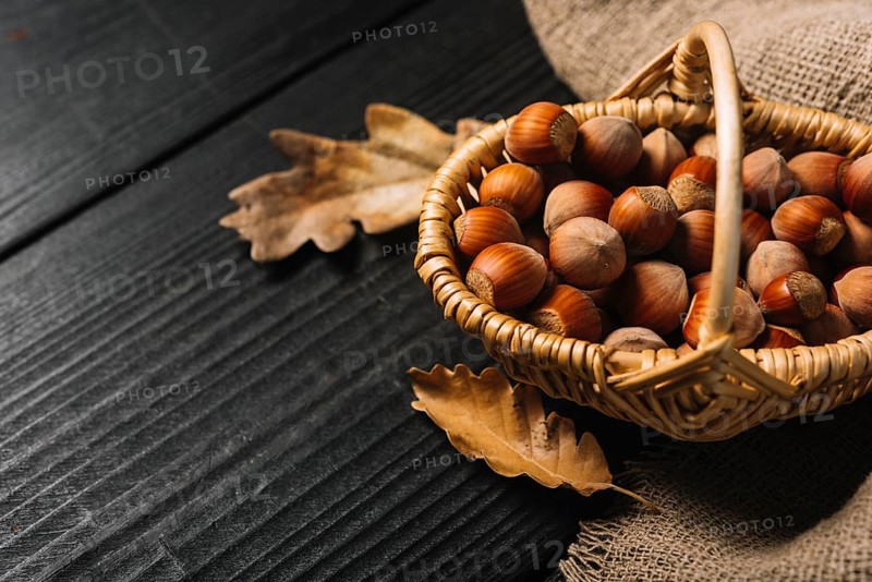 Leaves hazelnuts near fabric