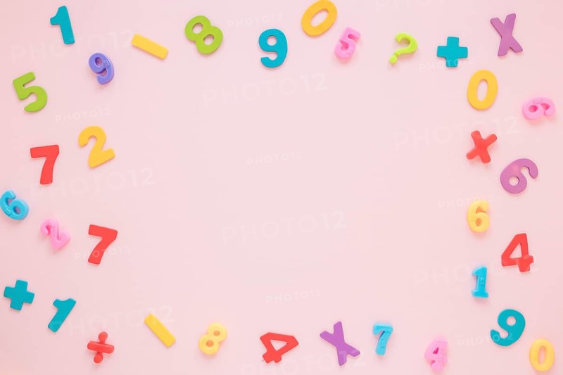 Colourful math numbers letters frame with copy space top view