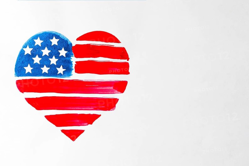 Painted red blue heart shape united states american flag white background