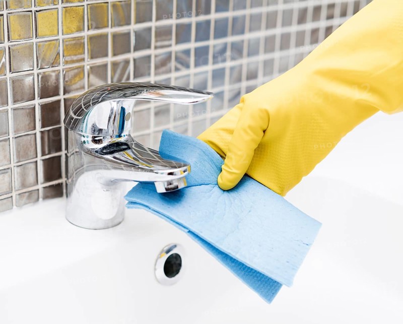 Sink faucet getting cleaned