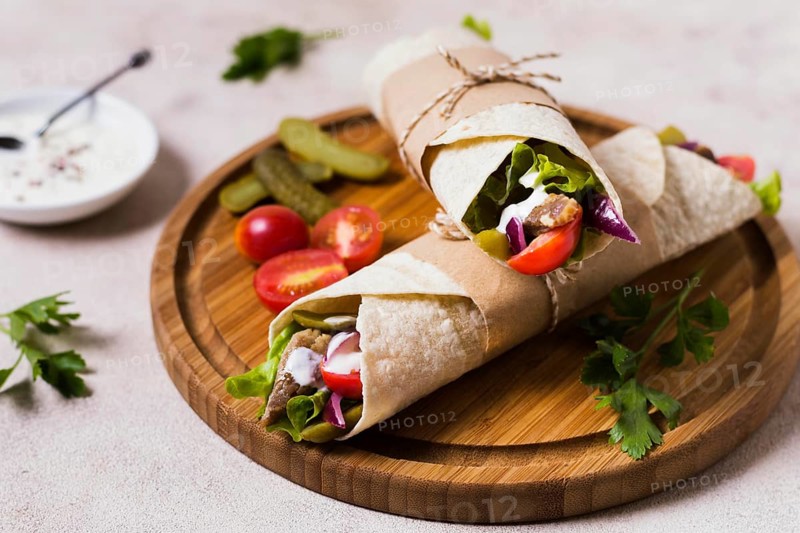 Arabic kebab sandwich wooden board high view