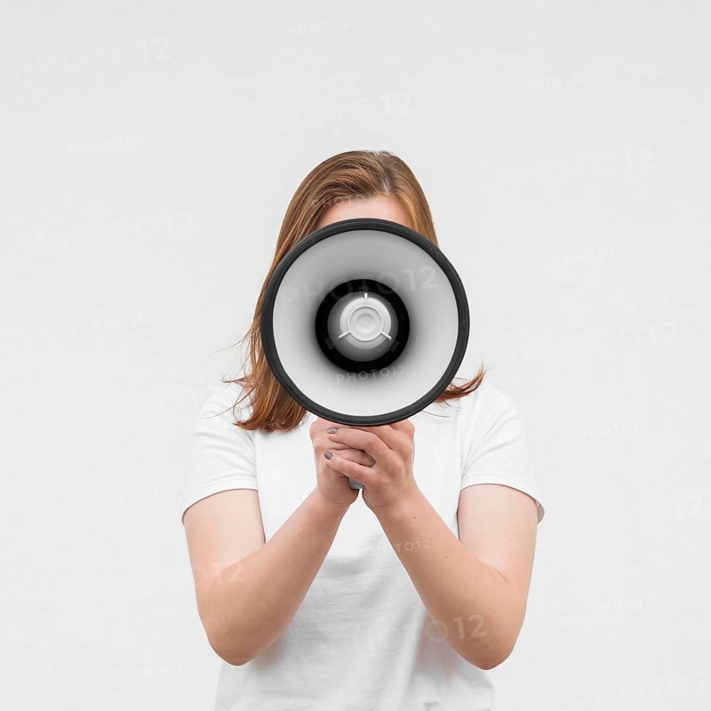 Front view girl screaming megaphone