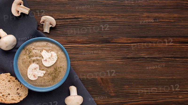 Top view winter mushroom soup bowl with copy space