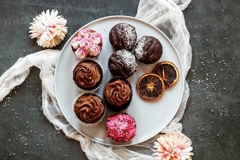 Flat lay delicious cupcakes concept