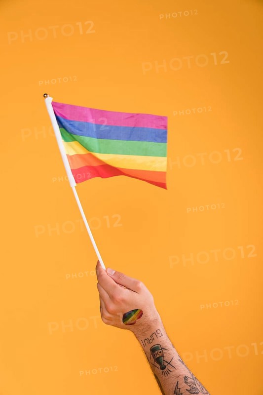 Hand waving with lgbt flag