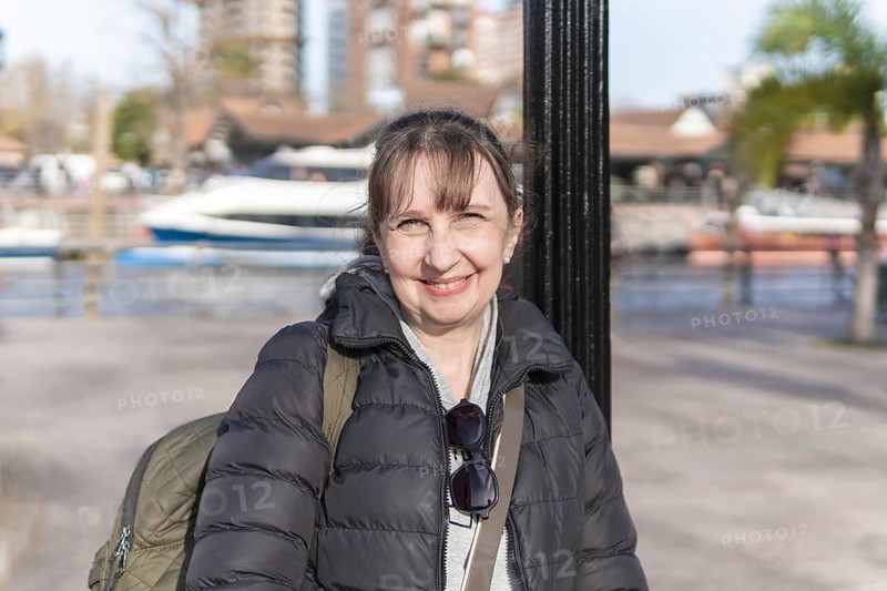 Portrait of a tourist walking along Paseo Victorica