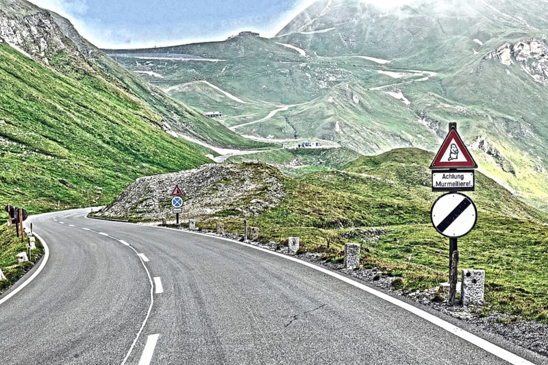Photo with reduced dynamic range saturation HDR with view of from mountain pass alpine mountain road alpine road pass road pass old Grossglockner High Alpine Road Grossglockner High Alpine Road above above tree line