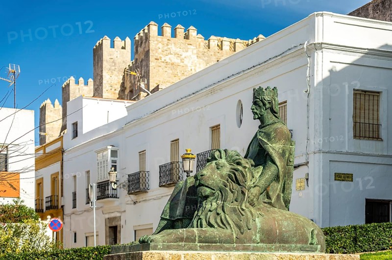 The monument to King Sancho IV El Bravo in front of Guzman Castle in Tarifa