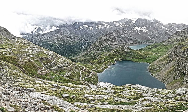 Photo with reduced dynamic range saturation HDR of view of serpentines with hairpin bends from Colle del Nivolet