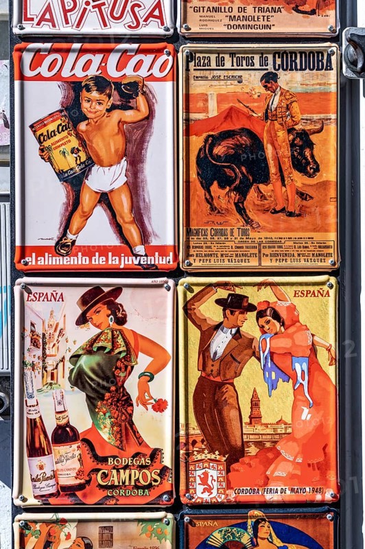 Nostalgic tin signs with Spanish advertising