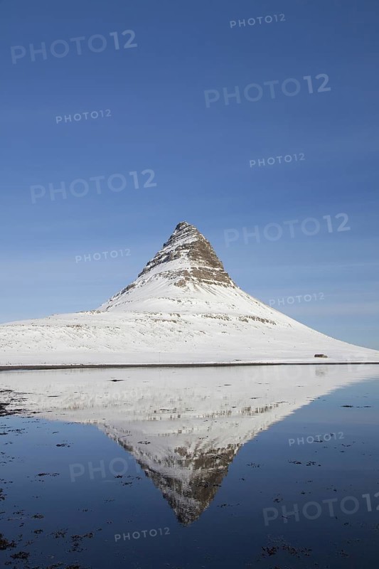 Kirkjufell mountain on the Snaefellsnes peninsula in the snow in winter
