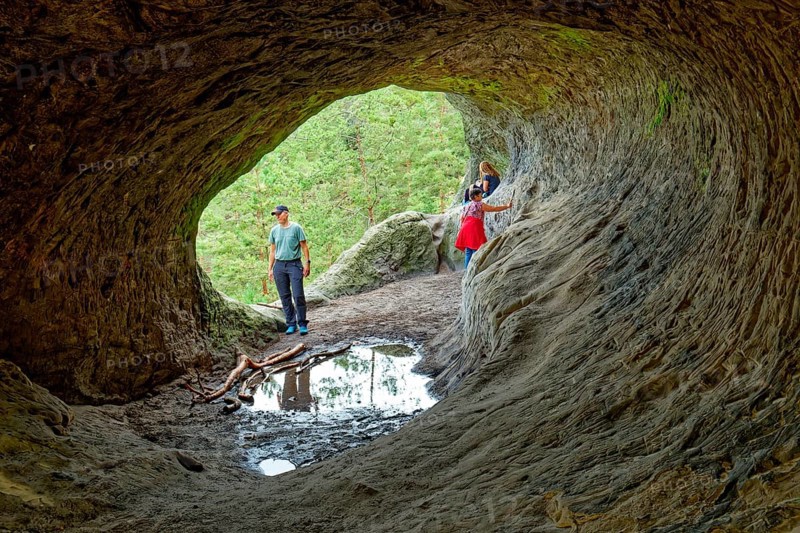 Stone tunnel at the rock formation Drei Zinnen