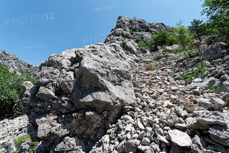 Steep rocks and boulders in the Velebit limestone mountains in Paklenica National Park in northern Dalmatia. Paklenica Starigrad