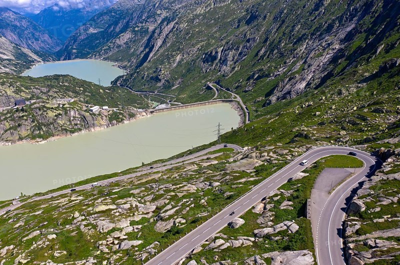 Serpentine of the Grimselpass road in front of the reservoirs Grimselsee