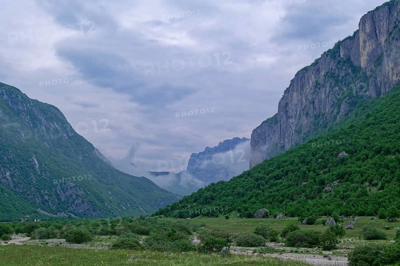 Komarnica Valley in the Dragisnica and Komarnica nature park Park with the mountains of the Durmitor massif and the Dinarides mountain range. Komarnica
