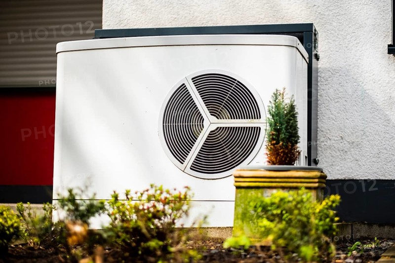Heat pump in the front garden of a terraced house in Monheim am Rhein