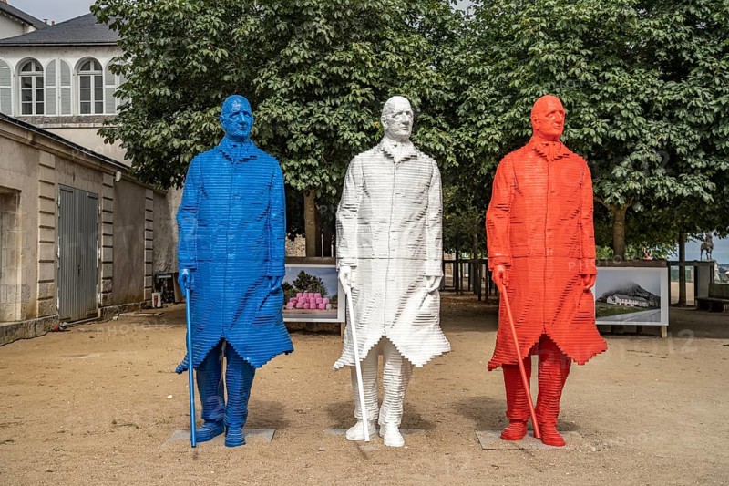 Three statues of Charles de Gaulle by the artist Michel Audiard in the colours of the Tricolore Blue