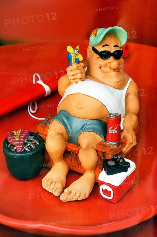 Shop window with funny ceramic figure