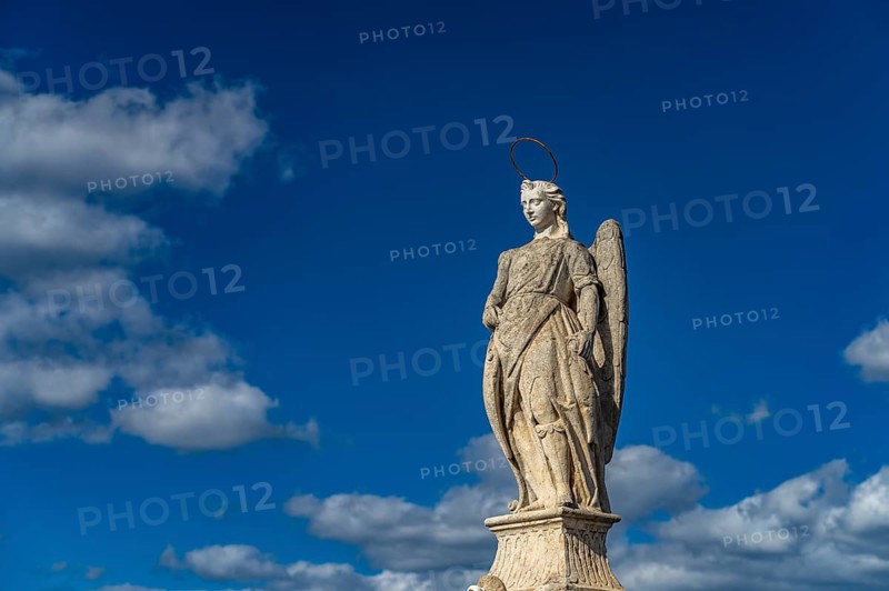Statue of the Archangel Raphael on the Roman Bridge in Cordoba