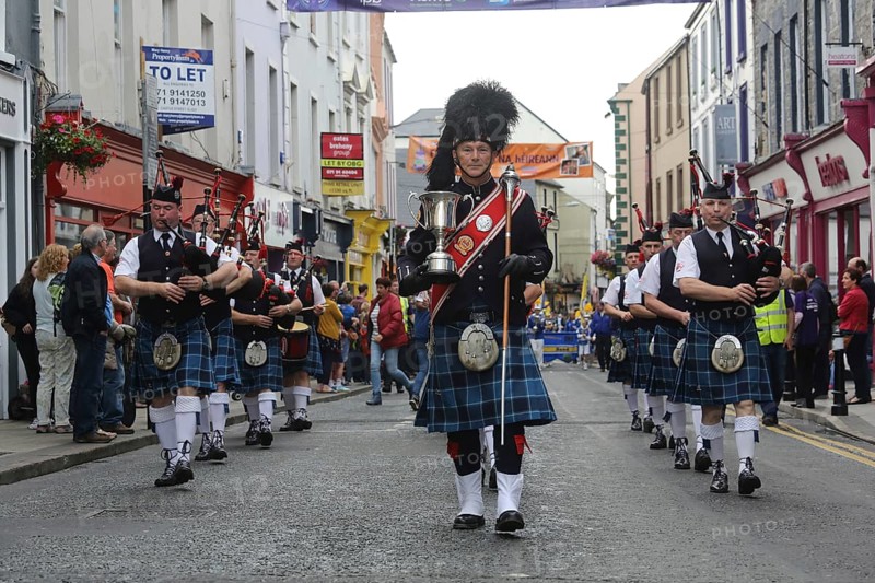 An Irish pipe band marches at the head of the final parade to mark the close of Fleadh Cheoil na hEireann