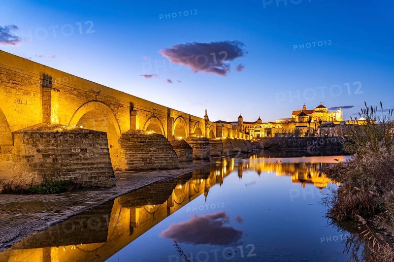 Roman bridge over the river Rio Guadalquivir and the Mezquita
