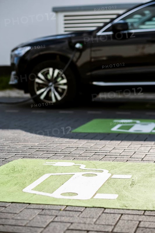 An e-car charges at a public charging station in Duesseldorf