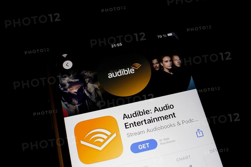 Detailed view of a smartphone with Audible app in the iPhone App Store