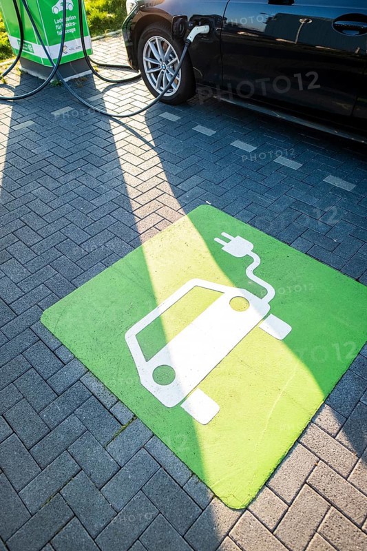 An e-car charges at a public charging station in Duesseldorf