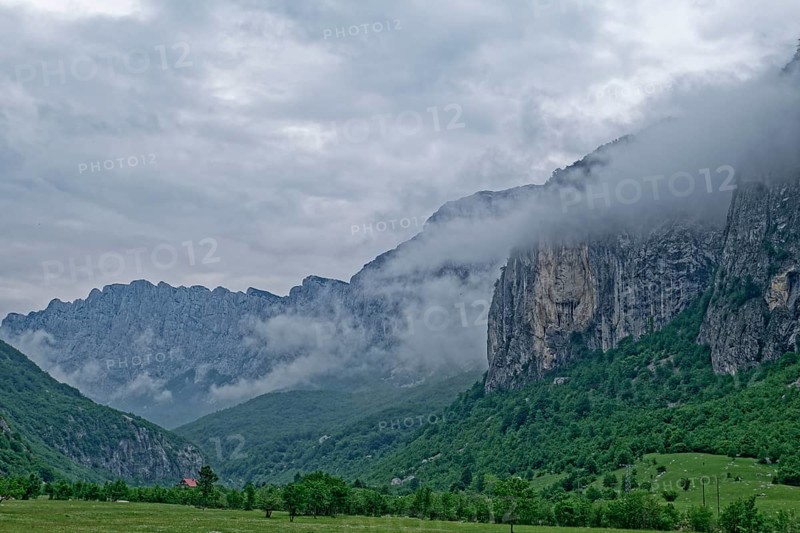 Komarnica Valley in the Dragisnica and Komarnica nature park Park with the mountains of the Durmitor massif and the Dinarides mountain range. Komarnica