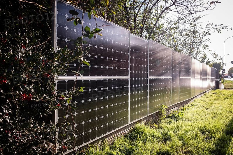 Solar panels as a garden fence and privacy screen of a house on a street in Langenfeld