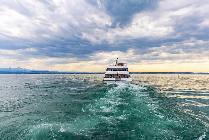 Lake Constance in the evening with the excursion boat Graf Zeppelin