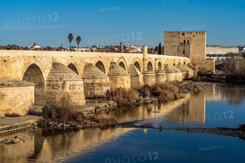 Roman bridge over the river Rio Guadalquivir and the Torre de la Calahorra in Cordoba