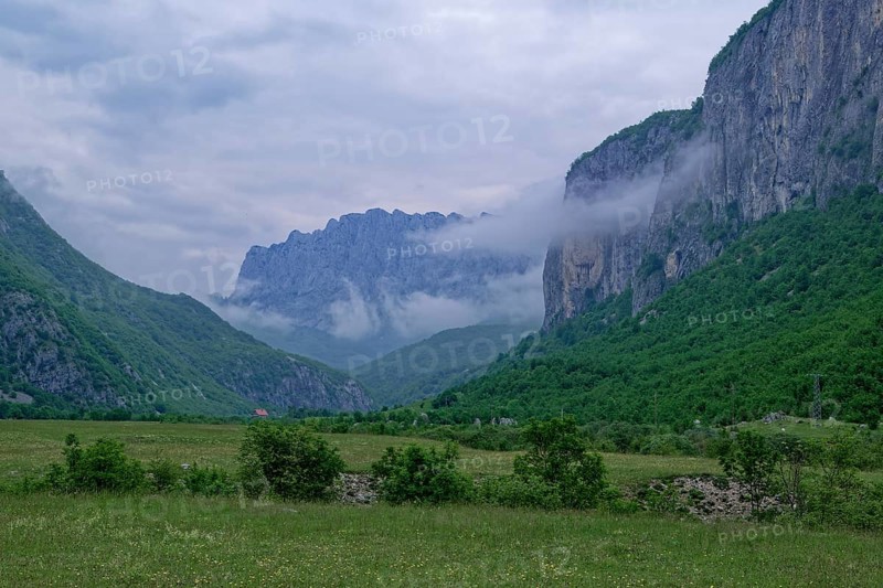 Komarnica Valley in the Dragisnica and Komarnica nature park Park with the mountains of the Durmitor massif and the Dinarides mountain range. Komarnica