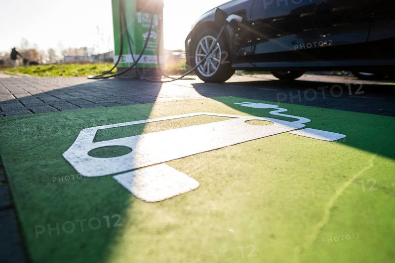 An e-car charges at a public charging station in Duesseldorf
