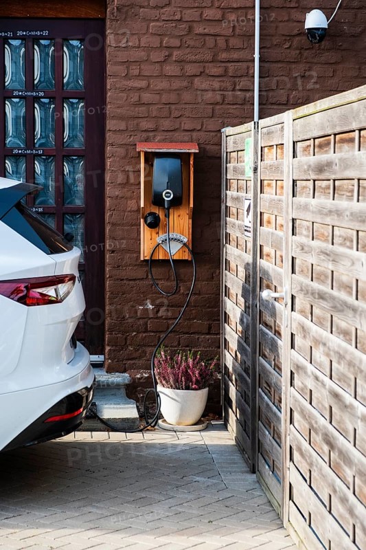 A car being charged at a public charging station