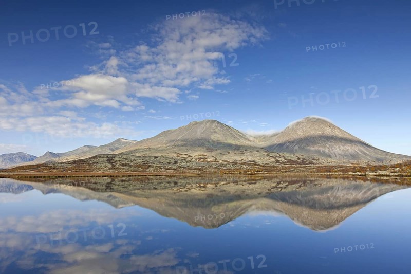 Stygghoin reflected in water of lake in autumn