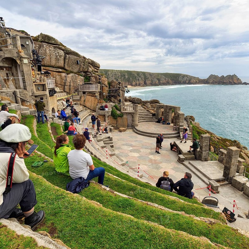 Grass-covered audience seats at The Minack Theatre
