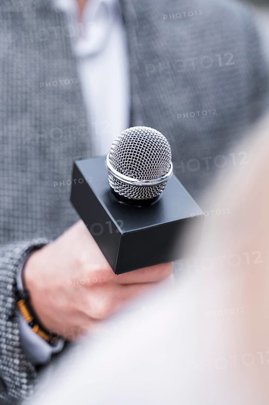 Close up journalism microphone