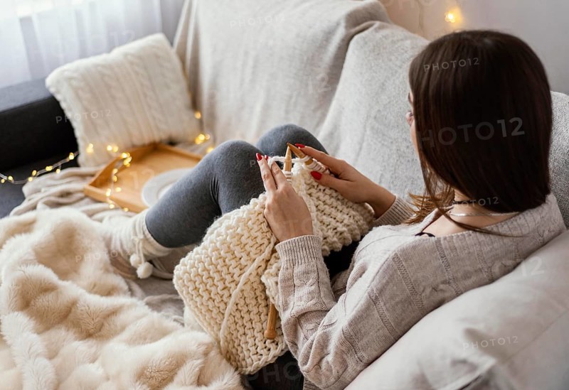 Woman with knitting tools