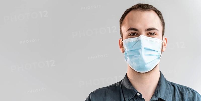 Portrait businessman with mask
