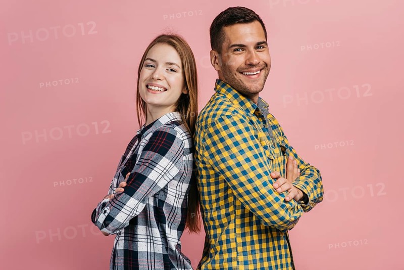 Man woman posing looking camera