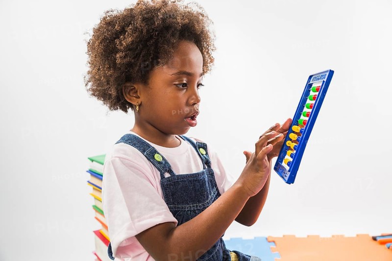 Cute kid with abacus studio
