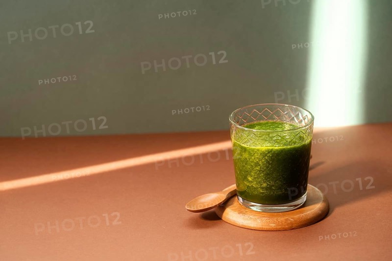 High angle green smoothie glass