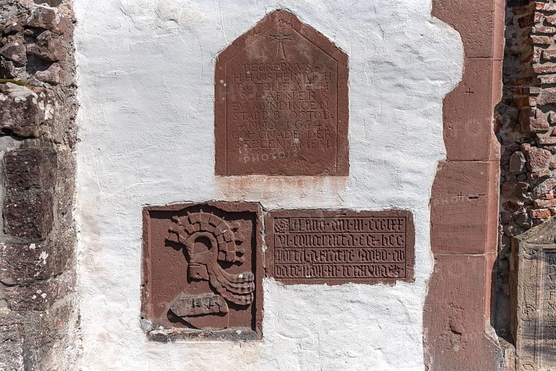 Grave plaques and coats of arms at the former abbey of the Cistercian monks