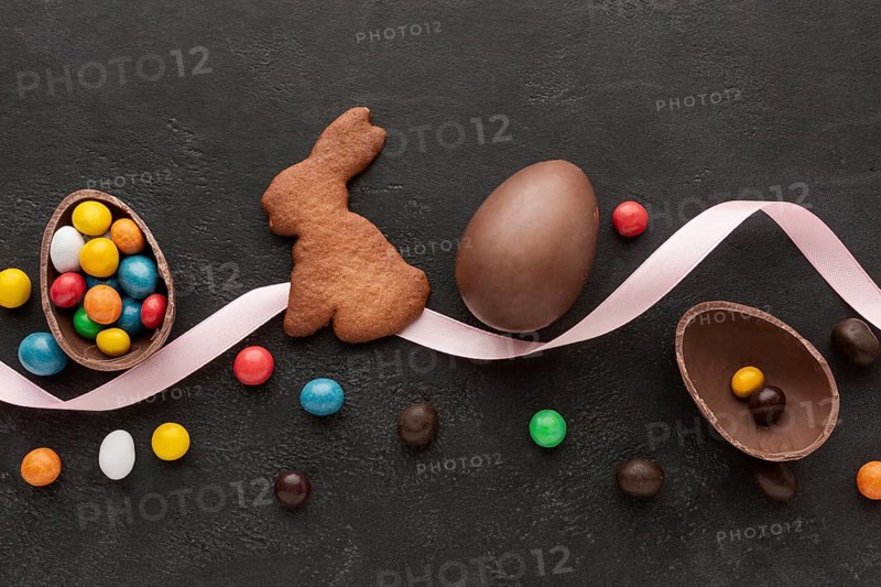 Chocolate egg easter bunny shaped cookie with candy