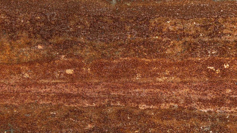 Abstract metallic surface with rust