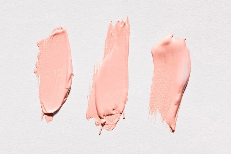 Top view pink paint brush strokes surface