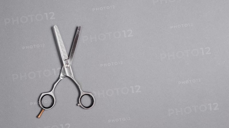 High angle view scissors grey background